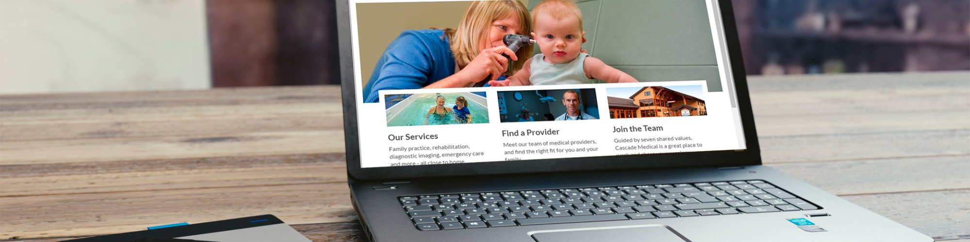 The new cascademedical.org is displayed on a laptop.