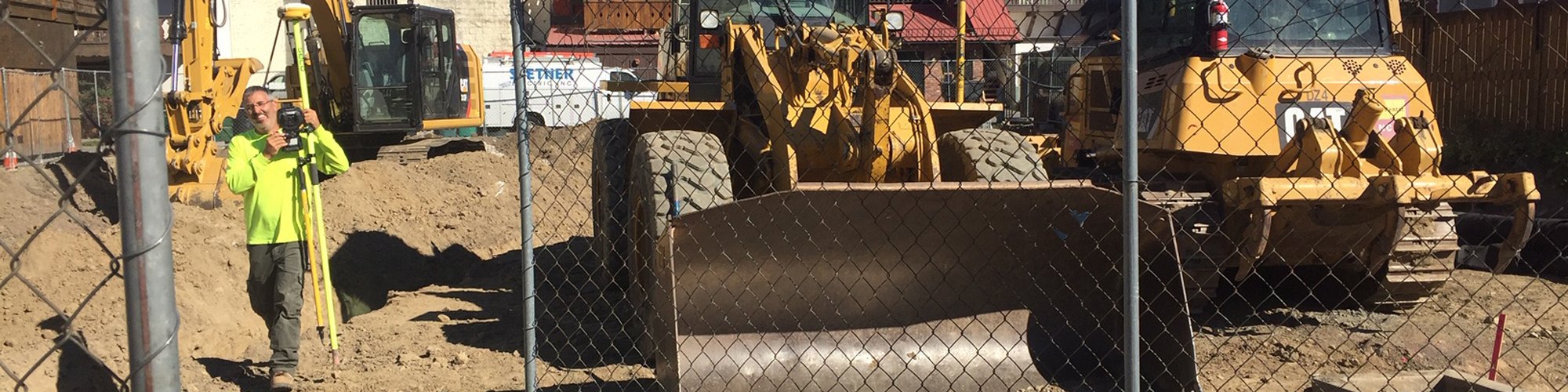 A construction worker at the site of the Commercial Street lot